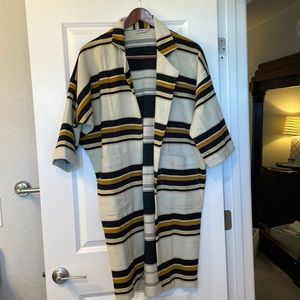 The Odells Anthropologie long jacket. Has pilling that comes off with a remover.